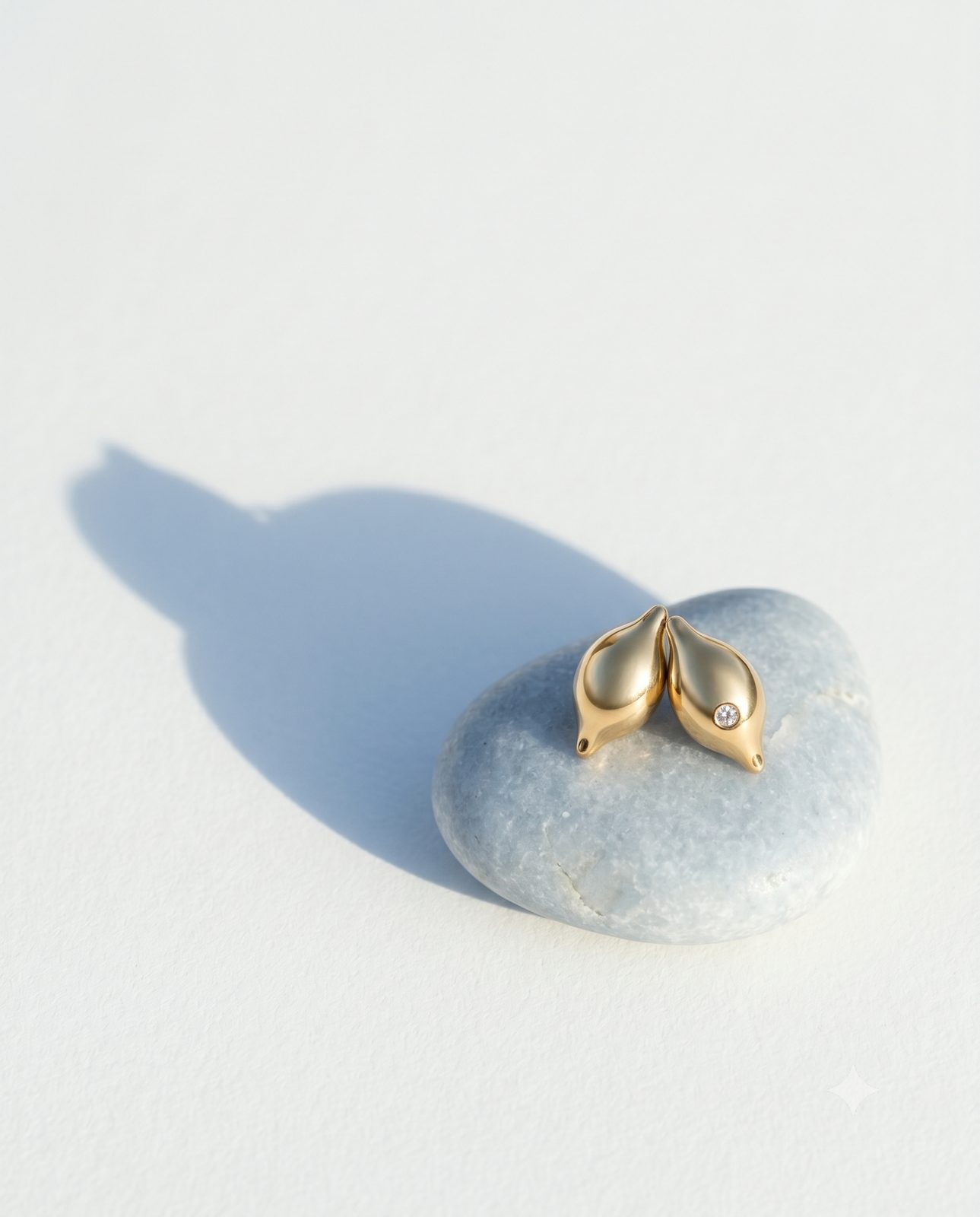 Seeds — pod-shaped gold earrings